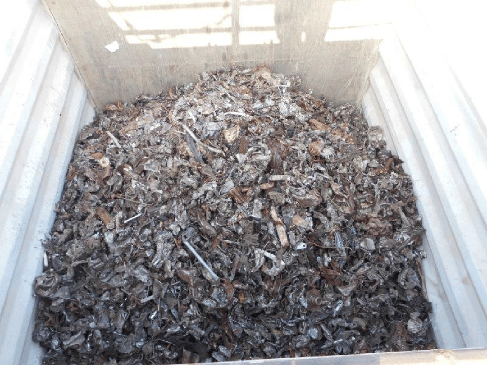 Industrial grade shredded steel scrap in container - high density auto shred for EAF furnaces